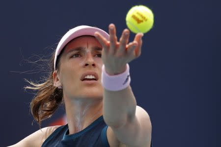 Mar 20, 2019; Miami Gardens, FL, USA; Andrea Petkovic of Germany serves against Amanda Anisimova of the United States (not pictured) in the first round of the Miami Open at Miami Open Tennis Complex. Geoff Burke