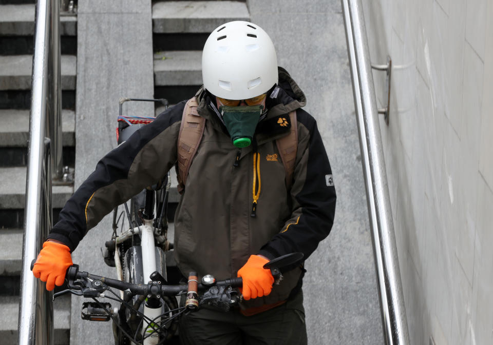 MOSCOW, RUSSIA - JUNE 1, 2020: A man with a bicycle by the Leningradsky railway station. According to a decree by Moscow Mayor Sergei Sobyanin, non-food retail facilities reopen starting June 1 as the lockdown restrictions are loosened amid the COVID-19 coronavirus pandemic. Vladimir Gerdo/TASS (Photo by Vladimir Gerdo\TASS via Getty Images)