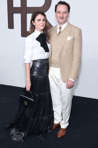 <p>Paul Morigi/Getty</p> Keri Russell and Matthew Rhys attend the Ralph Lauren fashion show during New York Fashion Week on September 08, 2023 in New York City.