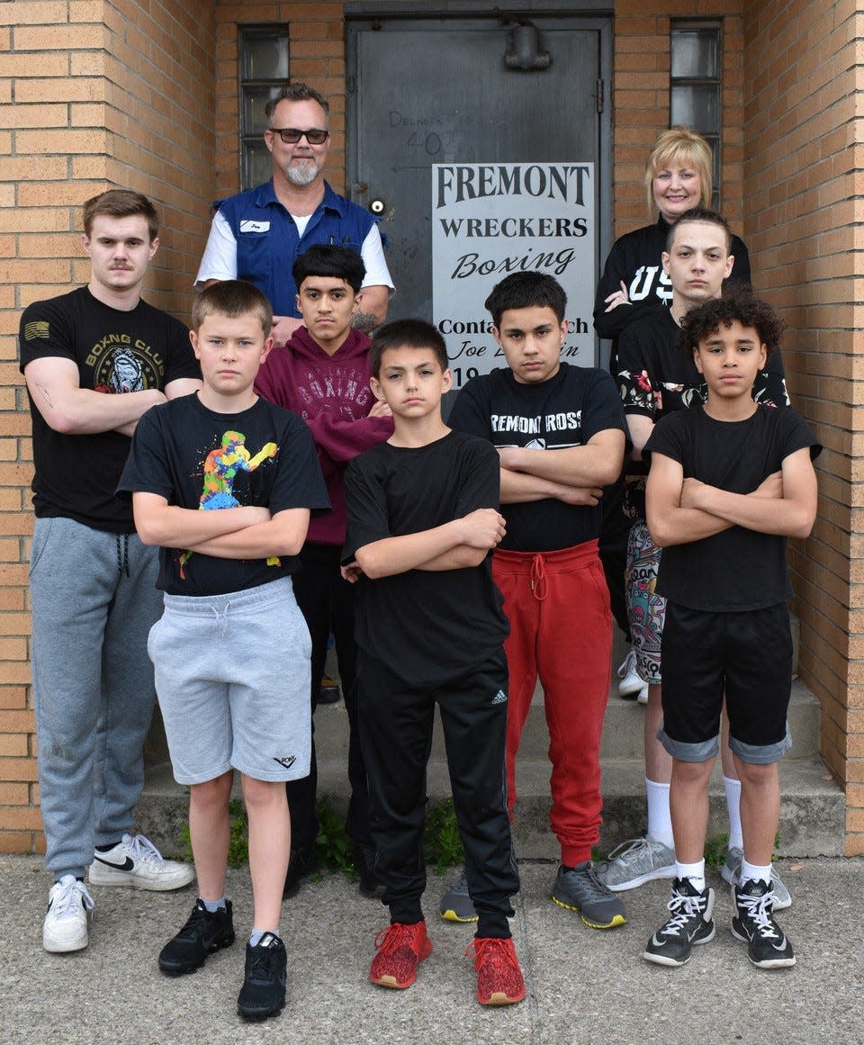 Fremont Wreckers Boxing Club owners Joe and Jody Laughlin, top row, train youths for life as they train them to box.