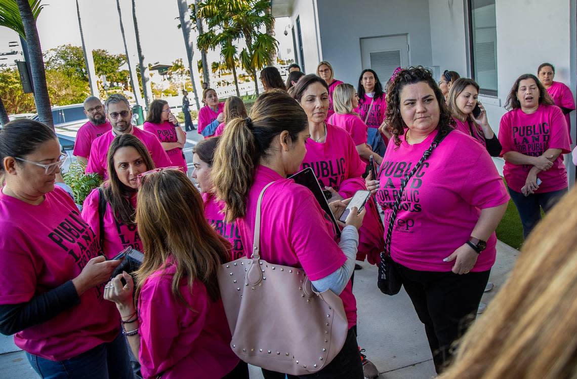 Parents at iPrep Academy, a Miami public school, showed up to the Miami City Commission meeting on Feb. 8, 2024 in hot pink T-shirts that read “public land for public schools.”