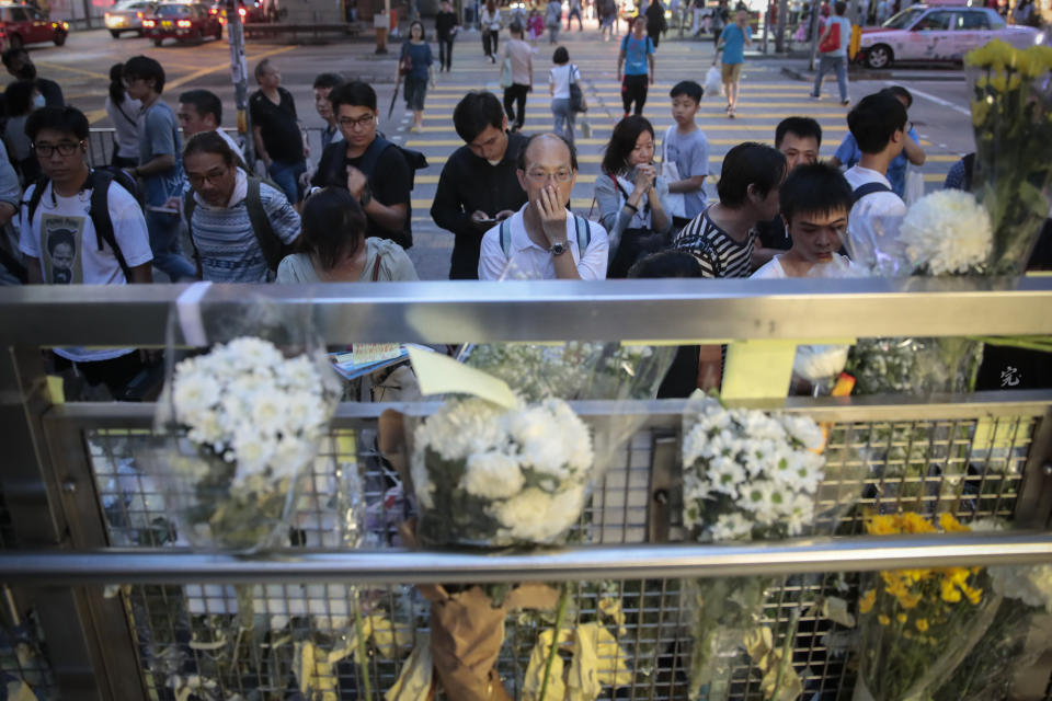 People pay their respects for protesters who were injured on Aug 31 outside Prince Edward station in Hong Kong on Wednesday, Sept. 4, 2019. Hong Kong Chief Executive Carrie Lam has announced the government will formally withdraw an extradition bill that has sparked months of demonstrations in the city, bowing to one of the protesters' demands. The bill would have allowed Hong Kong residents to be sent to mainland China for trials. It sparked massive protests that have become increasingly violent and caused the airport to shut down earlier this month. (AP Photo/Jae C. Hong)