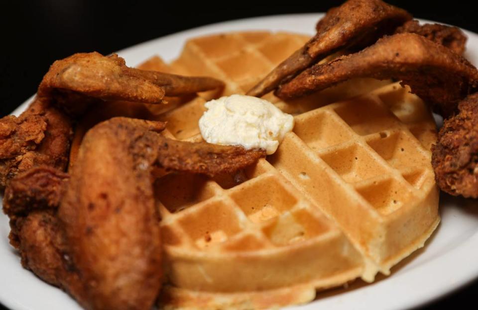 A plate of chicken and waffles is photographed at Kiki’s Chicken and Waffles in Columbia on Friday, March 29, 2024. The restaurant’s Kiki and Tyrone Cyrus are semifinalists for a 2024 James Beard Award.