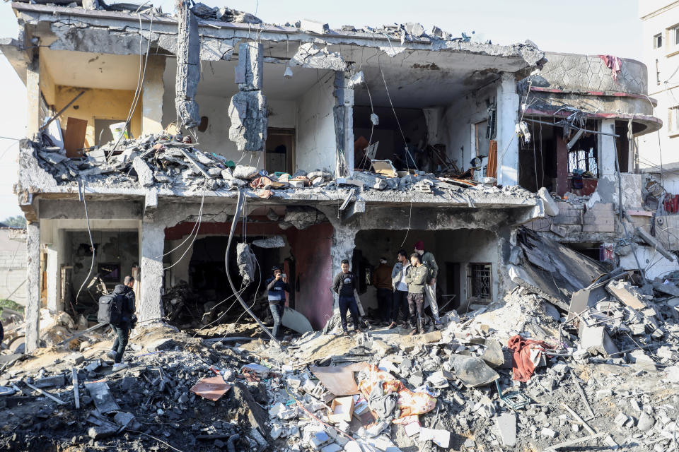 RAFAH, GAZA - DEC 19: A view of damage at the area after Israeli attack on December 19, 2023 in Rafah, Gaza. Civil defense teams and Palestinians in the area carried out search and rescue operations in the rubble of the buildings destroyed in the attack. It was reported that there were dead and wounded as a result of the Israeli army's attack on Rafah city in Gaza. (Photo by Abed Rahim Khatib/Anadolu via Getty Images)