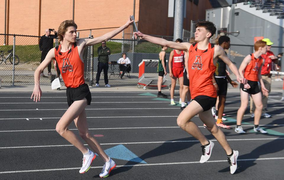 Charlie Bennett (right) is back to strengthen the Ames boys track team in distance events during the 2024 season.