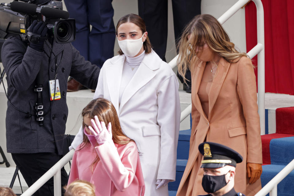 Naomi (left) and Finnegan Biden arrive at the inauguration. Cousin Natalie Biden walks in front of them. (Photo: Alex Wong via Getty Images)