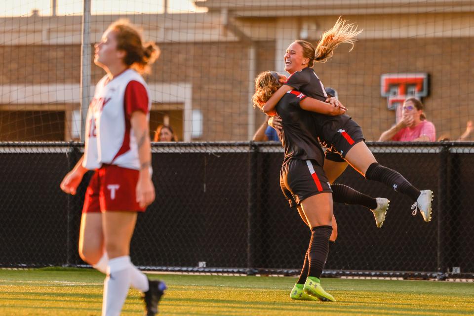 Texas Tech’s Macy Blackburn (23) and Ashleigh Williams (37) celebrate a goal during a NCAA soccer match on Thursday, Aug. 18, 2022, at the John Walker Soccer Complex in Lubbock, Texas.