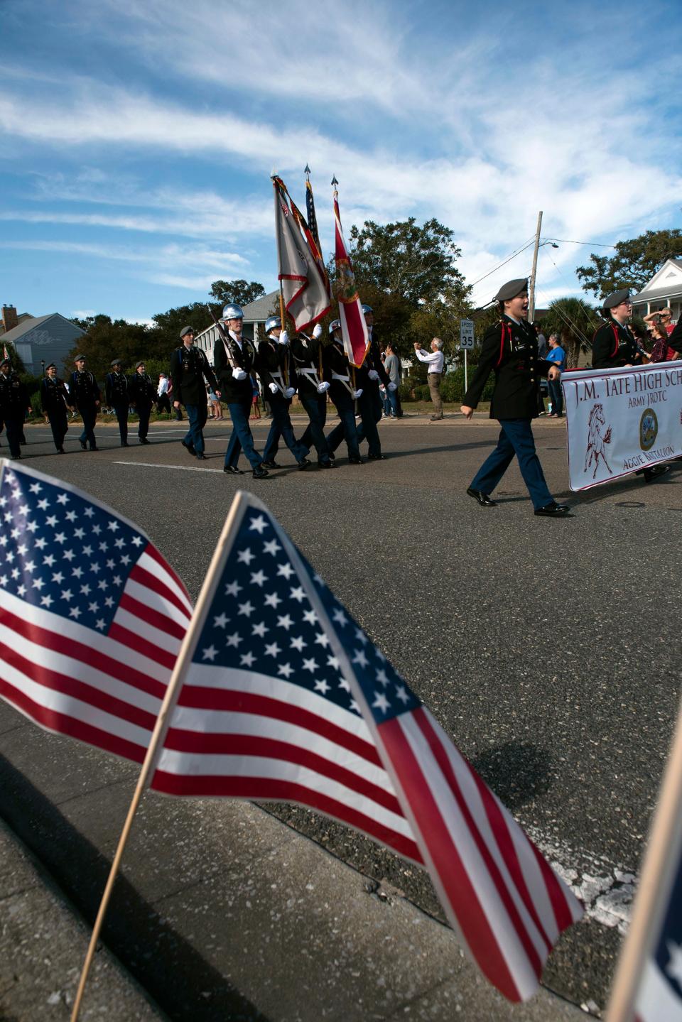 Veterans groups, members of law enforcement, civic organizations, high school ROTC units, marching bands, and politicians march along Bayfront Parkway on Nov. 11, 2021, during the annual Veterans Day parade in Pensacola.