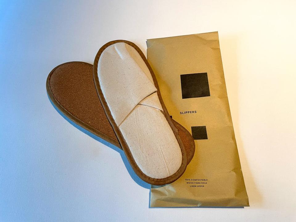 The pair of compostable slippers in the author's hotel room.