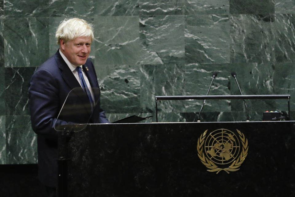 British Prime Minister Boris Johnson smiles before addressing the 74th session of the United Nations General Assembly, Tuesday, Sept. 24, 2019, at the U.N. headquarters. (AP Photo/Frank Franklin II)