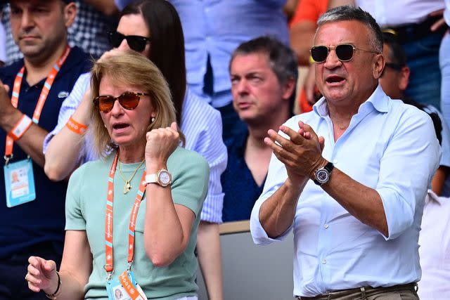 <p>EMMANUEL DUNAND/AFP via Getty</p> Srdjan and Dijana Djokovic cheer on their son, Novak Djokovic, on day fifteen of the Roland-Garros Open tennis tournament in Paris on June 11, 2023.