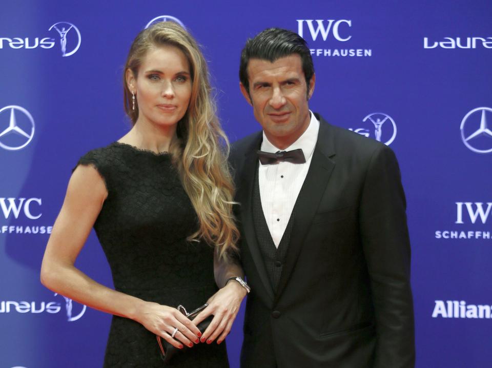 Former Portuguese soccer player Luis Figo and his wife Helen Svedin arrive for the Laureus World Sports Awards 2016 in Berlin, Germany, April 18, 2016.  REUTERS/Hannibal Hanschke
