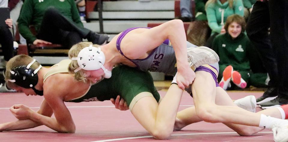 Watertown's Gage Lohr controls Sioux Falls Jefferson's Aidan Wells during their 106-pound championship match in the Region 1A wrestling tournament on Saturday, Feb. 18, 2023 at Madison. Lohr won 5-0.