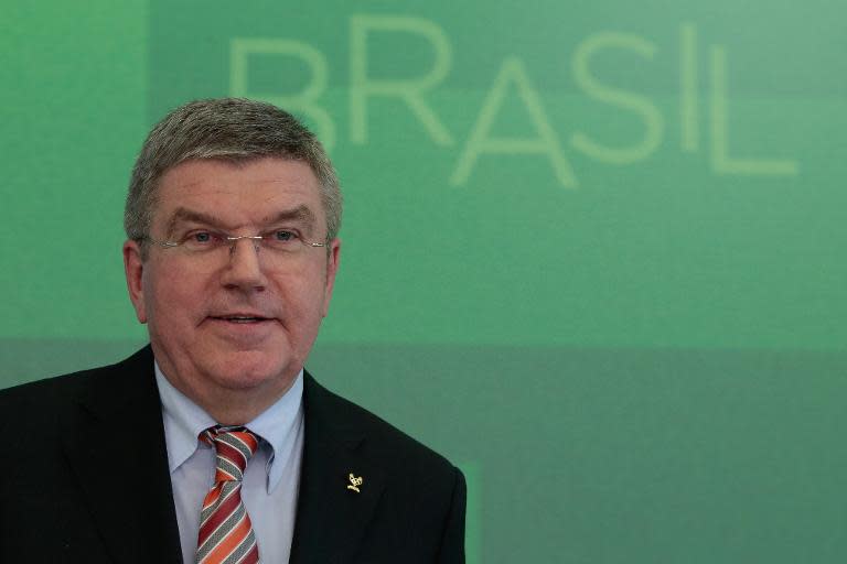 The president of the International Olympic Committee, Thomas Bach, speaks during a press conference at the Planalto Palace, in Brasilia on February 24, 2015