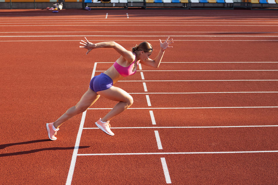 A woman running on a track iStock / Getty Images