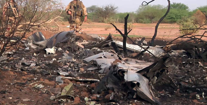 CLICK IMAGE for slideshow: This photo provided Friday July 25, 2014 by the French army shows soldiers at the site of the plane crash in Mali. French soldiers secured a black box from the Air Algerie wreckage site in a desolate region of restive northern Mali on Friday, the French president said. Terrorism hasn&amp;#39;t been ruled out as a cause, although officials say the most likely reason for the catastrophe that killed all onboard is bad weather. At least 116 people were killed in Thursday&amp;#39;s disaster, nearly half of whom were French. (AP Photo/ECPAD)