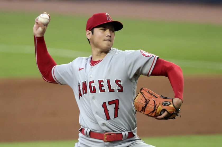 Los Angeles Angels starting pitcher Shohei Ohtani throws to an Atlanta Braves.