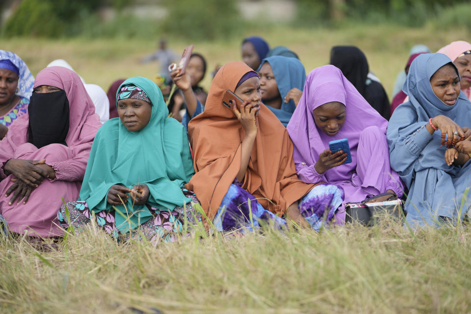 Nigerian Muslims women pray in an open ground field during the Eid al-Fitr prayers in Lagos, Nigeria, Friday, April 21, 2023. Muslims around the world celebrate the end of the holy month of Ramadan.(AP Photo/Sunday Alamba)