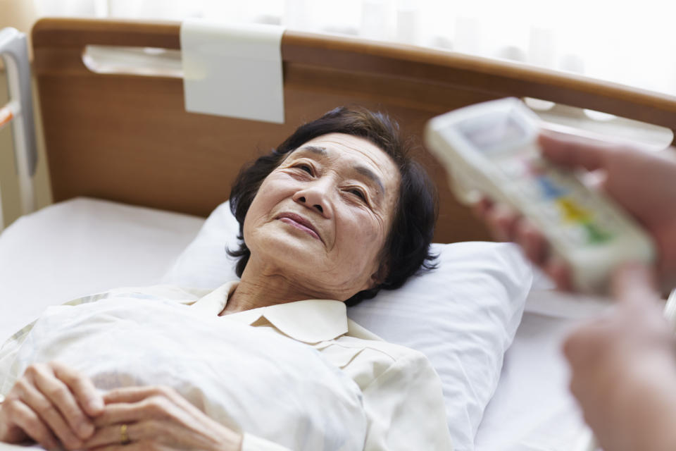 Senior patient in hospital bed