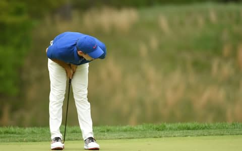 Rory McIlroy stoops in frustration after a missed putt - Credit: USA TODAY Sports