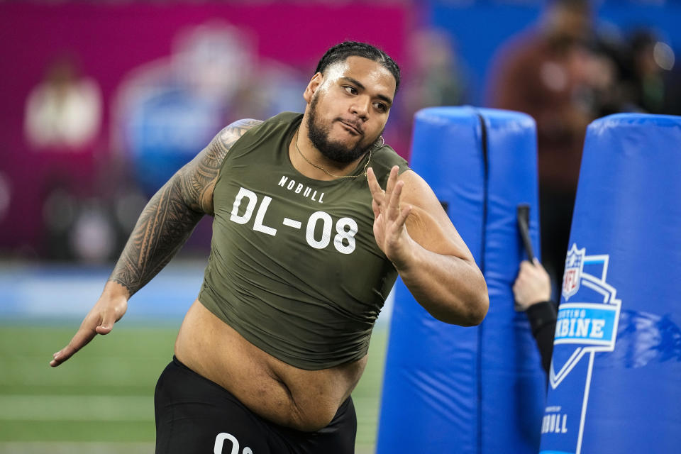 FILE - Baylor defensive lineman Siaki Ika runs a drill at the NFL football scouting combine in Indianapolis, Thursday, March 2, 2023. Ika was selected in the third round of the NFL draft by the Cleveland Browns. (AP Photo/Darron Cummings)