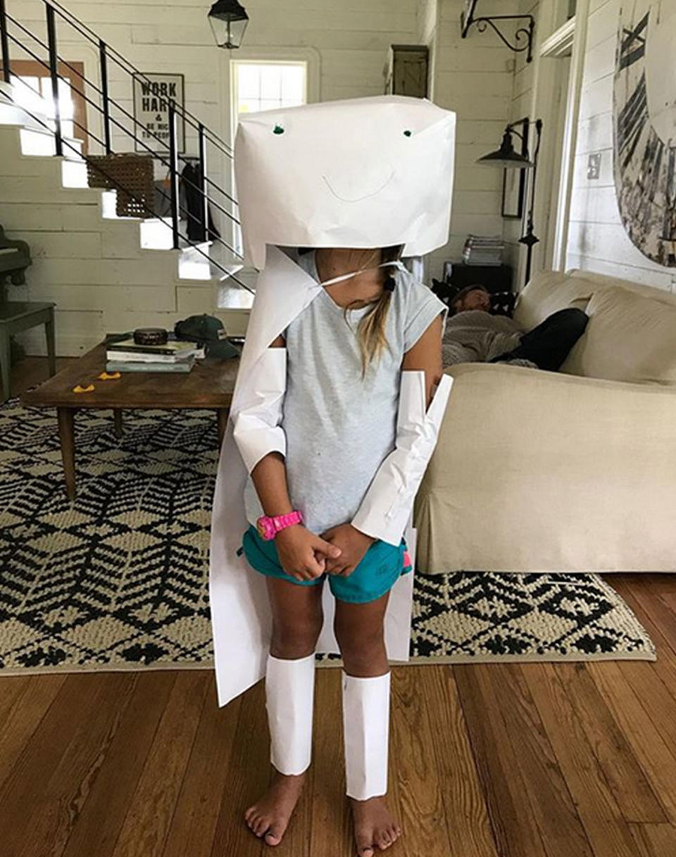 <p>Seven-year-old Emmie channels both mom and dad with this goofy crafted robot costume. "I like Saturdays," Joanna said of the DIY fashion show. </p>