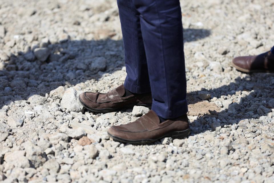 Rishi Sunak wears £490 brown Prada suede loafers on visit to Teesside building site (REUTERS)