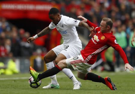 Britain Football Soccer - Manchester United v Swansea City - Premier League - Old Trafford - 30/4/17 Manchester United's Wayne Rooney in action with Swansea City's Leroy Fer Action Images via Reuters / Jason Cairnduff Livepic