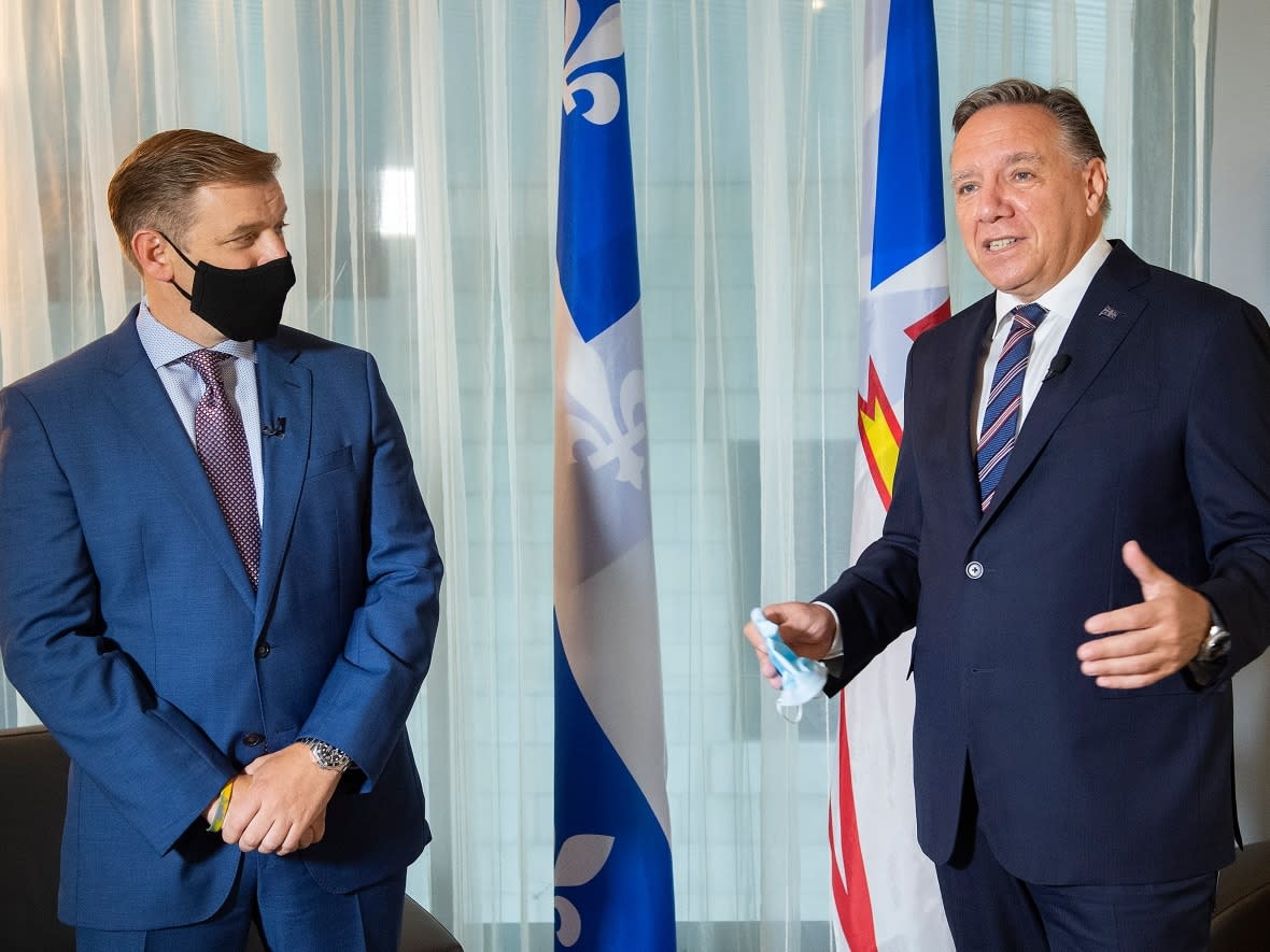 Quebec Premier Francois Legault is eager to meet and negotiate a deal with Newfoundland and Labrador's Andrew Furey. (The Canadian Press - image credit)