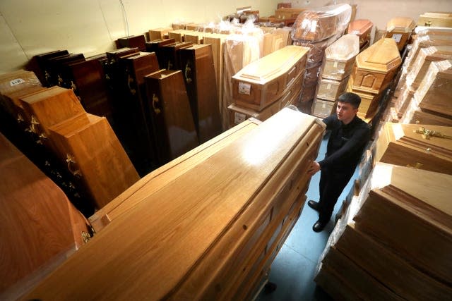 Empty coffins in a storage room in Glasgow (Andrew Milligan/PA)