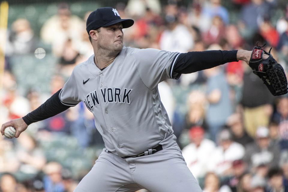 New York Yankees starting pitcher Gerrit Cole delivers against the Cleveland Guardians during the first inning of a baseball game in Cleveland, Tuesday April 11, 2023. (AP Photo/Phil Long)
