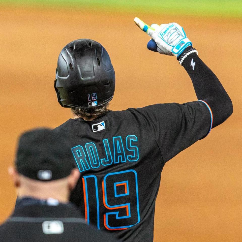 Miami Marlins shortstop Miguel RojasÂ (19) reacts after hitting a line drive to center field during the first inning of an MLB game against the Milwaukee Brewers at loanDepot park in the Little Havana neighborhood of Miami, Florida, on Friday, May 7, 2021.