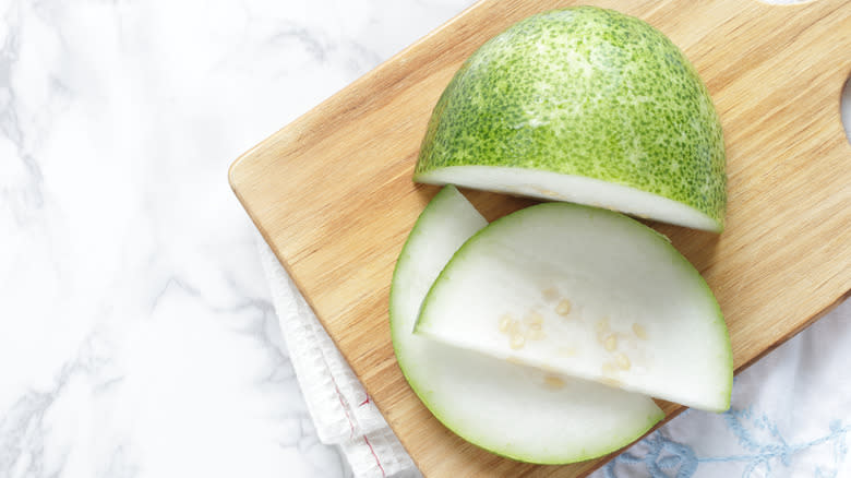 sliced winter melon on board