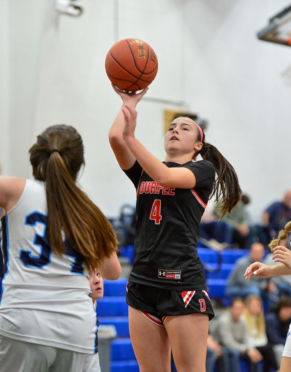 Durfee’s Julia Hargraves attempts a shot over Seekonk’s Emily Leonard.