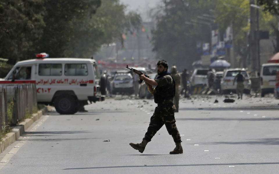 Afghan security personnel arrive at the site of car bomb explosion in Kabul, Afghanistan, Thursday, Sept. 5, 2019. A large car bomb rocked the Afghan capital on Thursday and smoke rose from a part of eastern Kabul near a neighborhood housing the U.S. Embassy, the NATO Resolute Support mission and other diplomatic missions. At least three people were killed and another 30 wounded, a hospital director said. (AP Photo/Rahmat Gul)