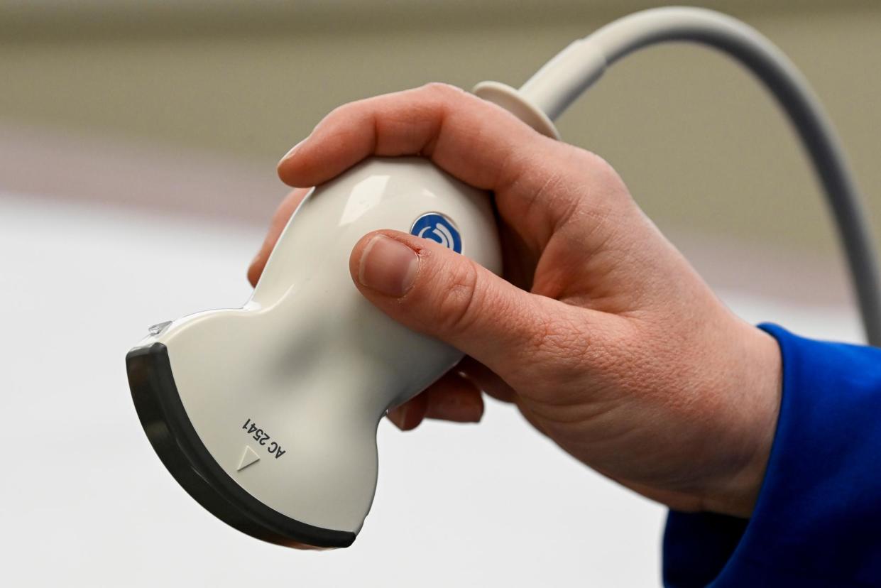 <span>A nurse holds an ultrasound abdominal probe at an anti-abortion pregnancy center in Murfreesboro, Tennessee, in 2022. Centers reported receiving hundreds of millions of dollars in donations from private funders between 2018 and 2022. </span><span>Photograph: Mark Zaleski/AP</span>