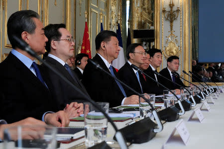 Chinese President Xi Jinping attends a meeting with French President Emmanuel Macron (not seen) at the Elysee Palace in Paris, France, March 25, 2019. REUTERS/Gonzalo Fuentes/Pool