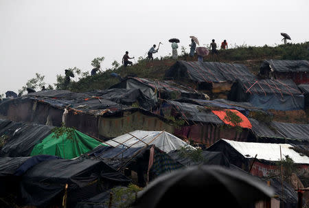 Rohingya refugees clear a hillside to set up shelters in Cox's Bazar, Bangladesh, September 20, 2017. REUTERS/Cathal McNaughton