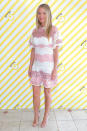 <p>Gwyneth looked sugary sweet in a white-and-pink lace Burberry dress.<br><i>[Photo: Getty]</i> </p>