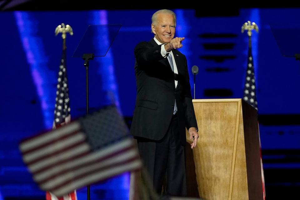 President-elect Joe Biden gestures on stage after speaking in Wilmington, Del., on Saturday night.