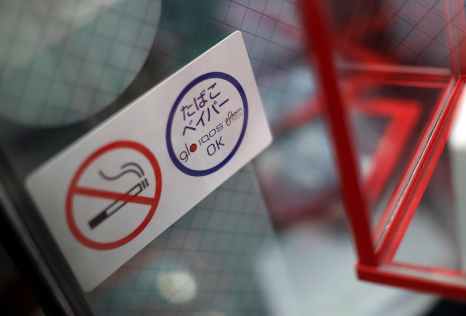 A sign board indicates that visitors are only allowed to use vaping device Reuters