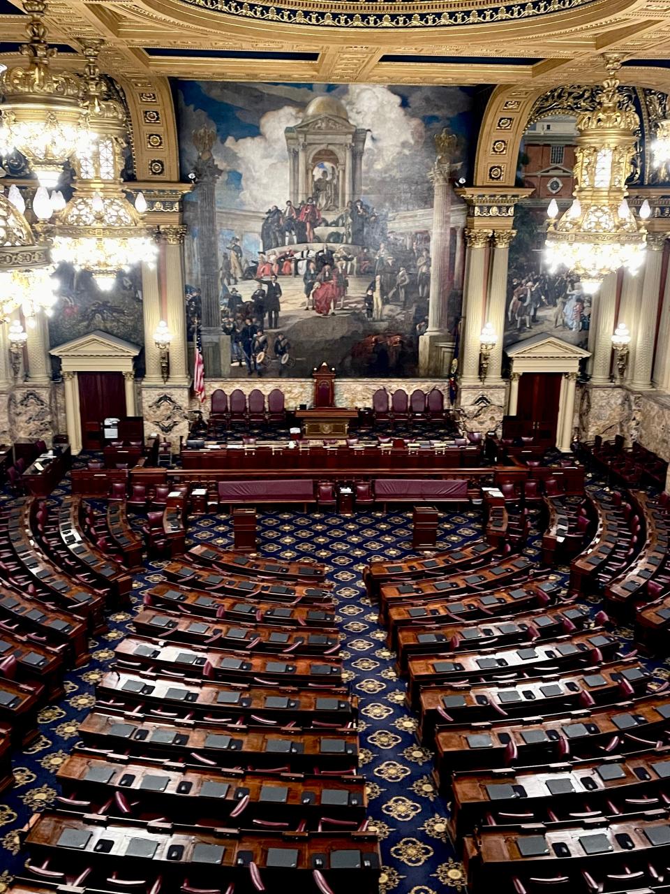 The large mural "The Apotheosis of Pennsylvania" is located directly behind the house speaker's podium.