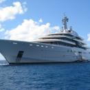 <p>This sleek yacht belongs to Roman Abramovich, billionaire businessman, politician, and owner of the Chelsea Football Club. Some of the likely amenities on board include a three-person submarine, a 52-foot pool that can be converted into a dance floor, and an exterior fireplace. <em>Eclipse</em> is believed to accommodate 36 guests and 70 crew members.</p>