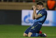 Arsenal's Olivier Giroud reacts during their Champions League round of 16 second leg soccer match against AS Monaco at the Louis II Stadium in Monaco, March 17, 2015. REUTERS/Jean-Paul Pelissier (MONACO - Tags: SPORT SOCCER)