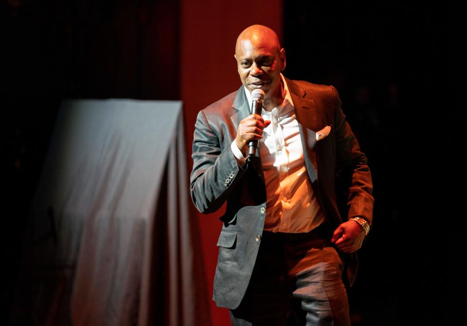 Dave Chappelle performs during a theater dedication ceremony honoring the comedian and actor, and to raise funds to support Duke Ellington School of the Arts in Washington, Monday, June. 20, 2022. (AP Photo/Gemunu Amarasinghe) ORG XMIT: DCGA101