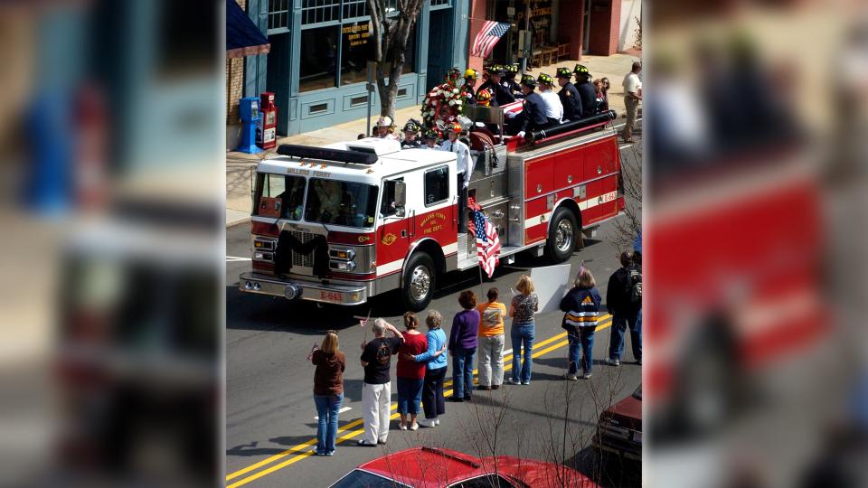 The Salisbury Fire Department escorts the bodies of Victor Isler and Justin Monroe Thursday, March 13, 2008, in Salisbury, N.C. Firefighters Monroe and Isler lost their lives in a five-alarm fire in Salisbury, N.C. (AP Photo/Salisbury Post, Jon C. Lakey)