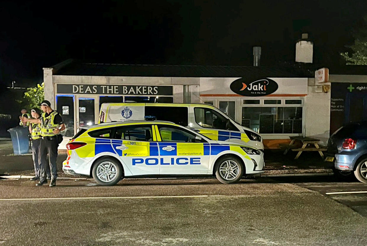 Police attended Jaki's Fish and Chip Shop in Muir of Ord, Highlands, after angry locals egged the shop's windows. (SWNS)