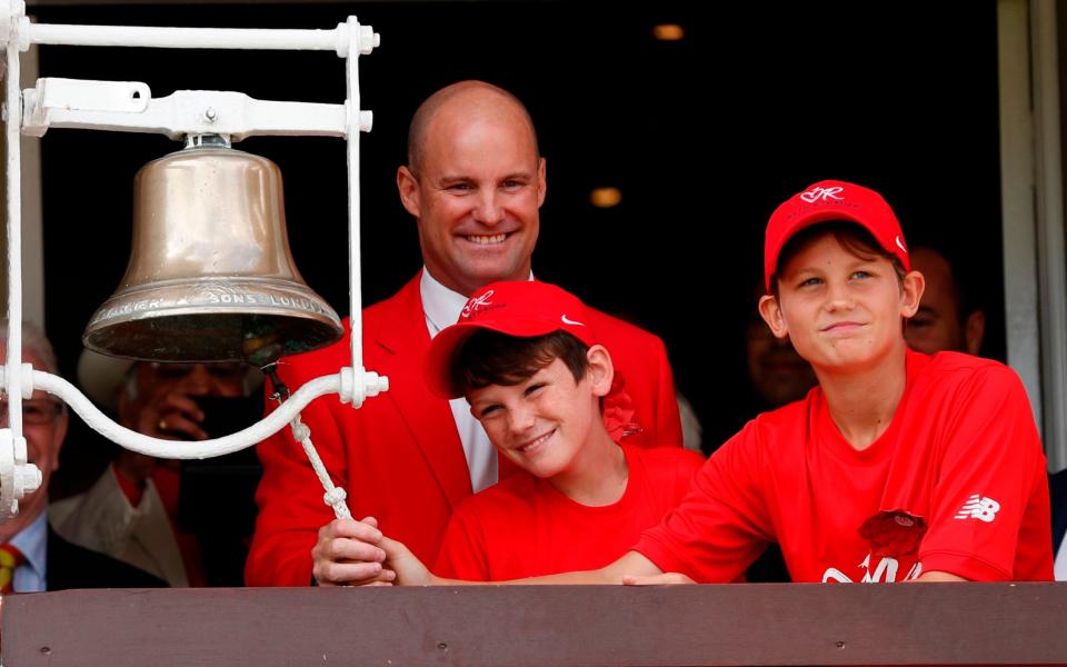 Andrew Strauss and his two sons ring the five minute bell to show support for The Ruth Strauss Foundation at Lord's - AFP