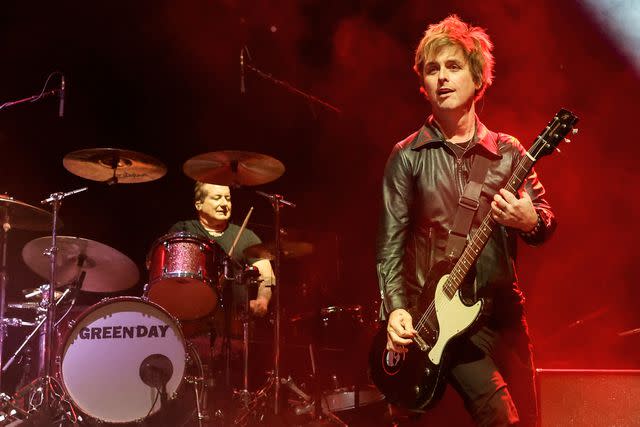 <p>Ethan Miller/Getty</p> Green Day performing at EA Sports' The Madden Bowl at the House of Blues Las Vegas in February 2024