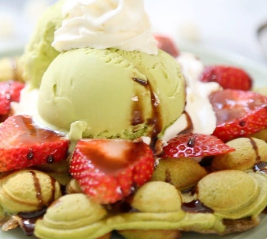 <p>You can enjoy a burst of mochi flavor as you bite into a crispy chewy bubble waffle when you try making your own Mochi Stuffed Waffles.</p><p><strong>Get The Recipe: <a href="https://www.angelwongskitchen.com/matchabubblewaffle.html" rel="nofollow noopener" target="_blank" data-ylk="slk:Mochi Stuffed Waffles;elm:context_link;itc:0;sec:content-canvas" class="link ">Mochi Stuffed Waffles</a></strong></p>